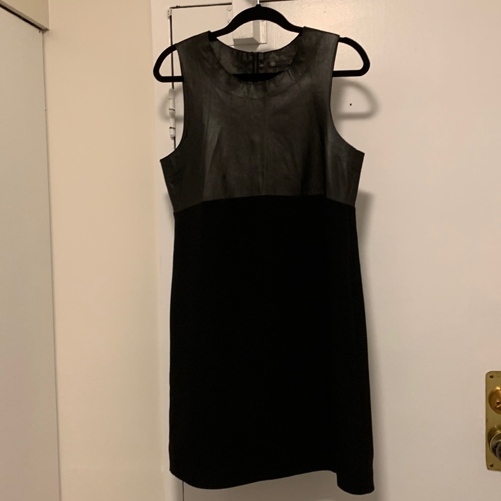 Absolutely gorgeous dress upper is real leather and the rest silk!